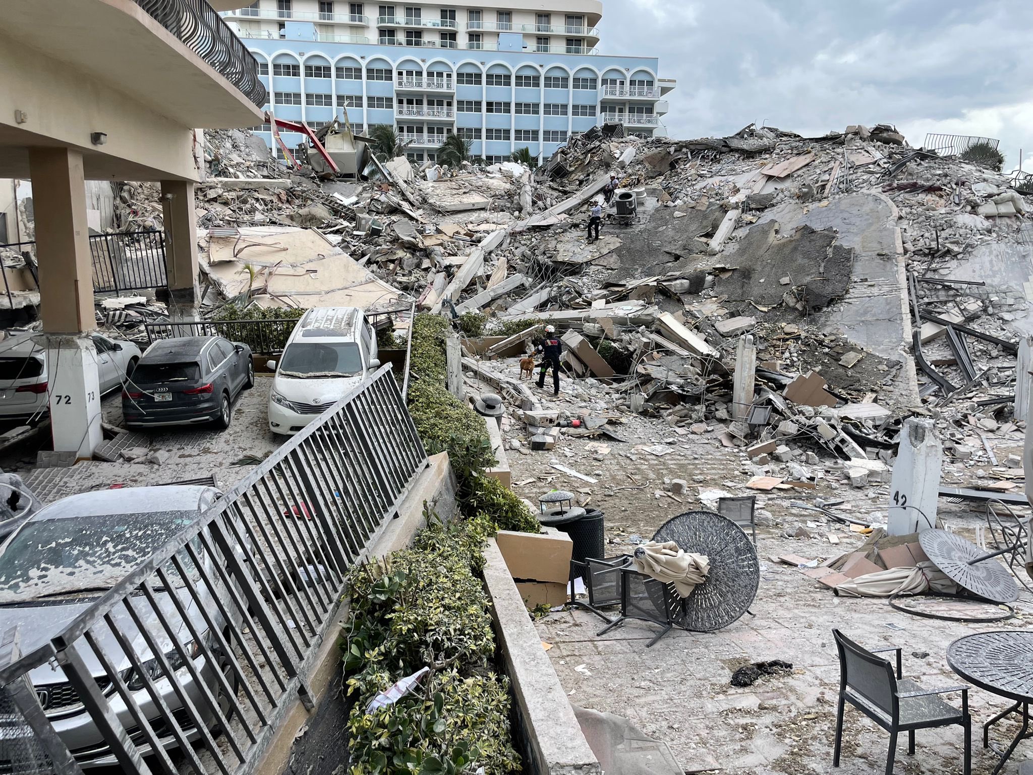 A ground view of the partially collapsed 12-story beachfront Champlain Towers South condominium building on June 24, 2021, in Miami, Florida